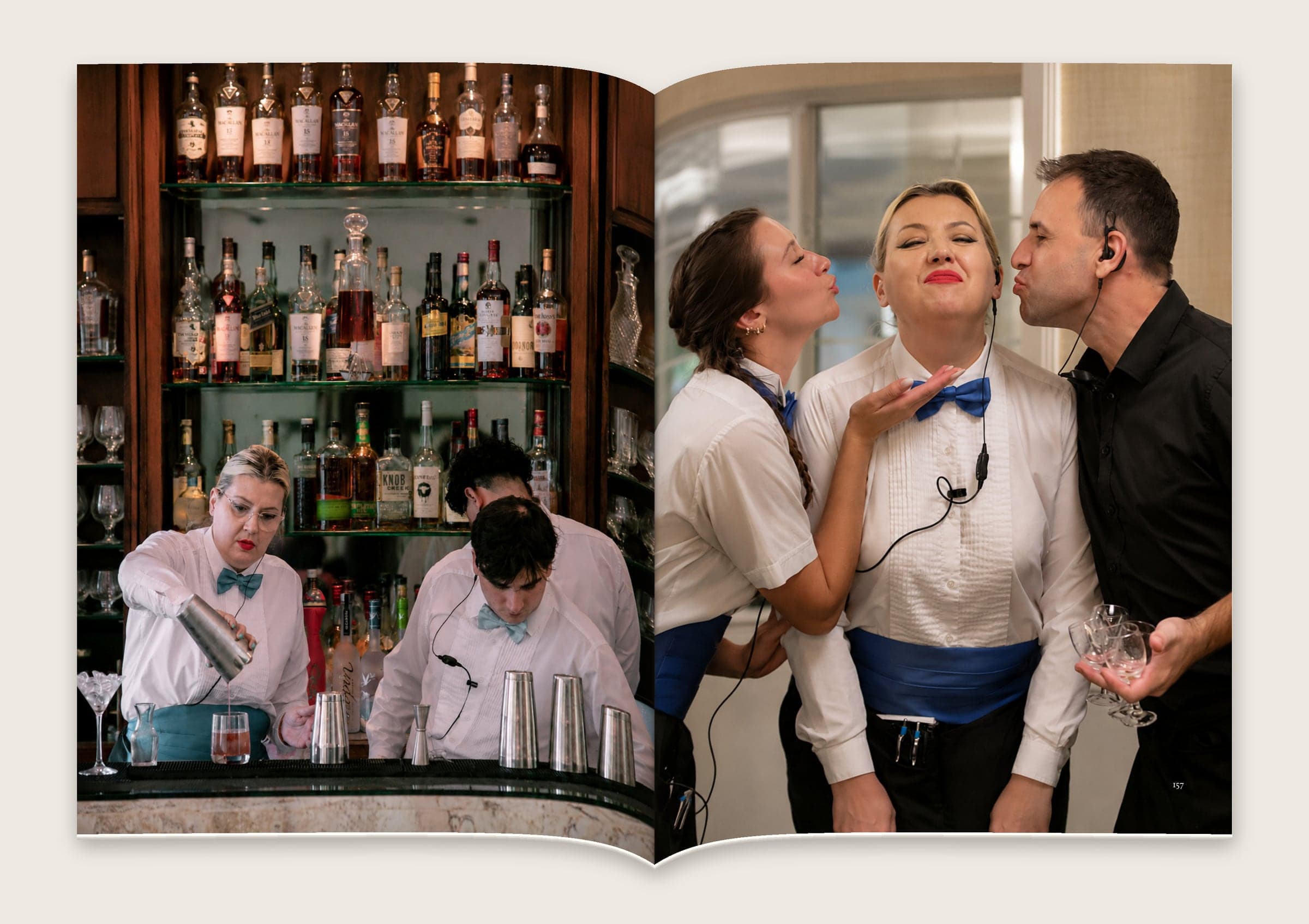 Spread of the bar team at work and sharing a joke in white shirts and blue bow ties.